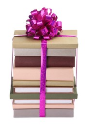 Photo of Stack of books with purple bow as gift isolated on white