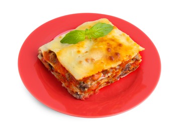 Photo of Piece of delicious cooked lasagna with basil isolated on white