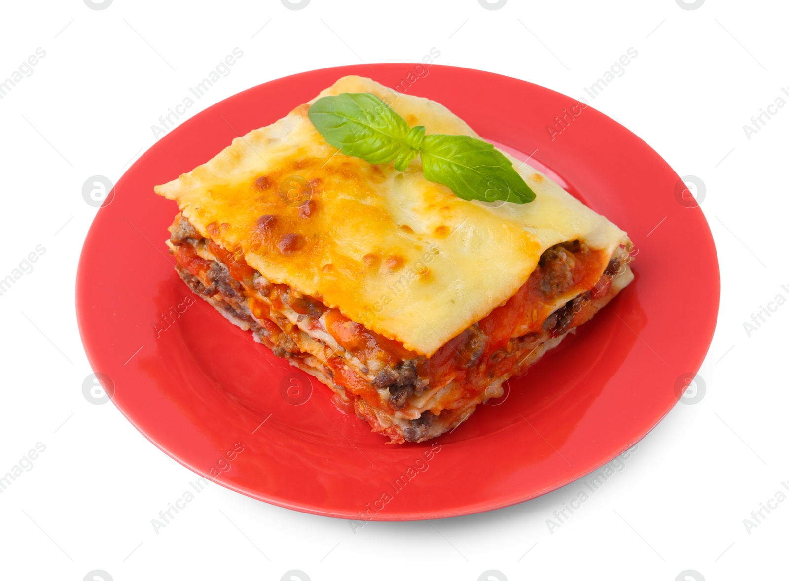 Photo of Piece of delicious cooked lasagna with basil isolated on white