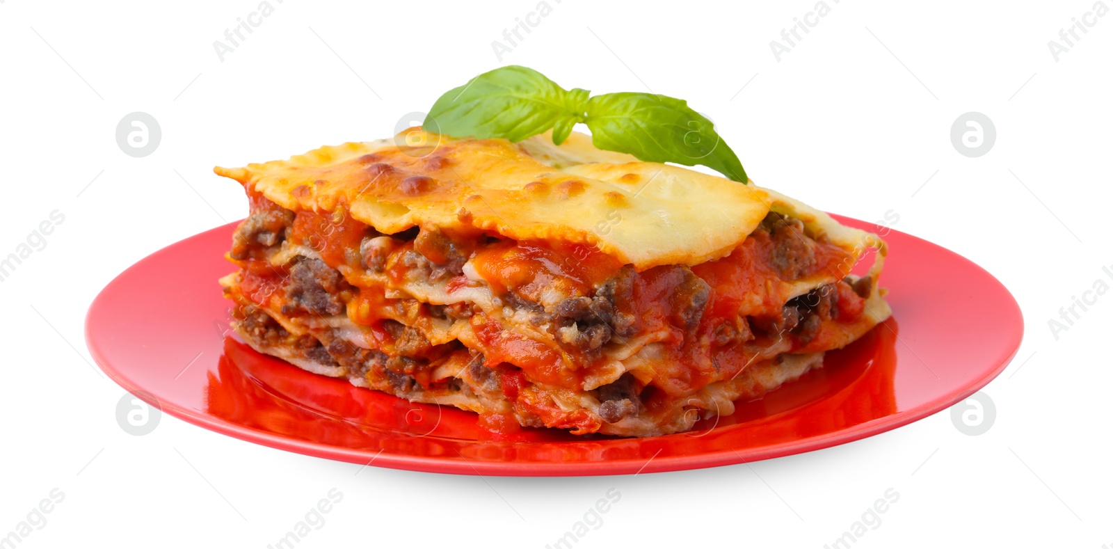 Photo of Piece of delicious cooked lasagna with basil isolated on white