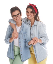 Photo of Portrait of beautiful twin sisters on white background