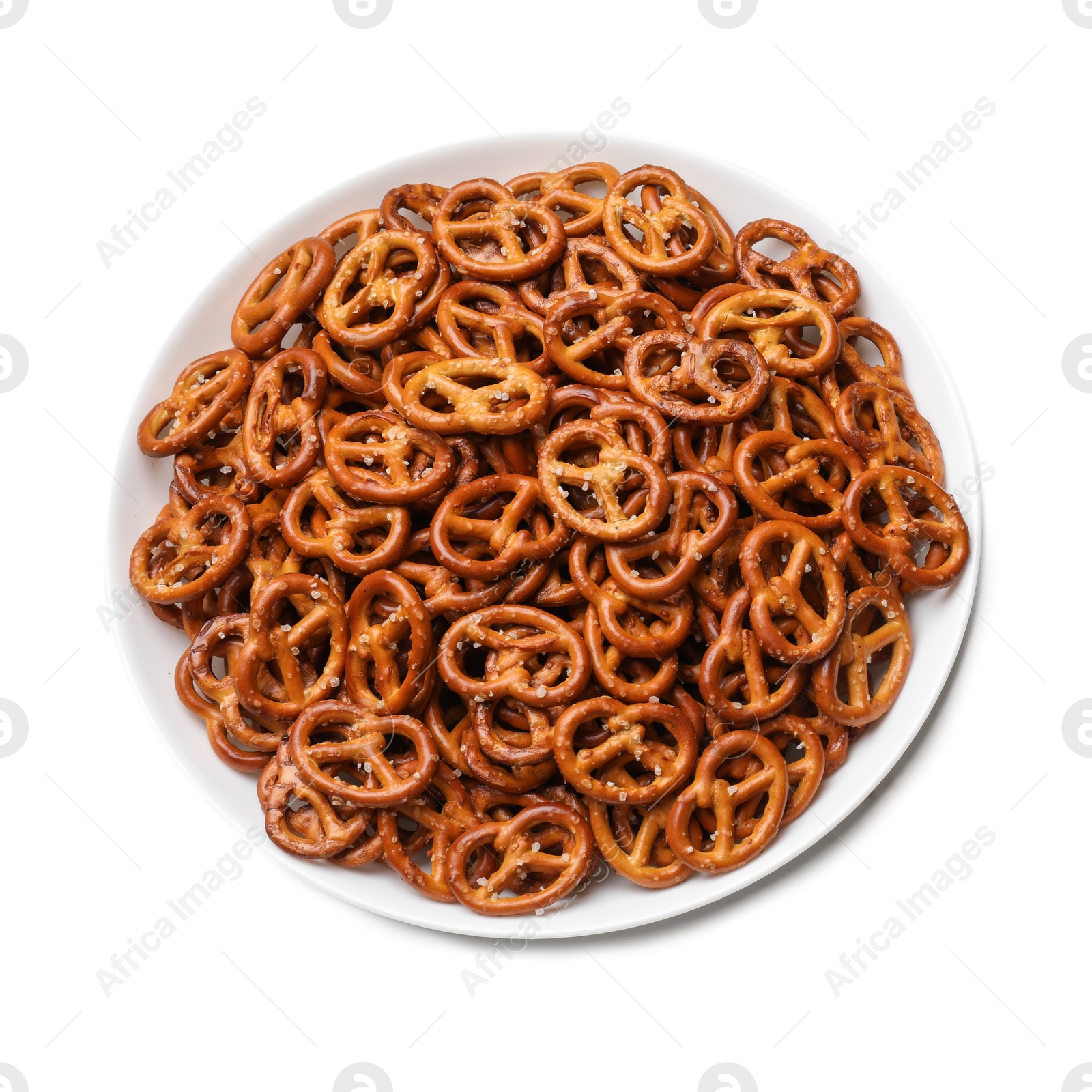 Photo of Tasty pretzel crackers in bowl isolated on white, top view