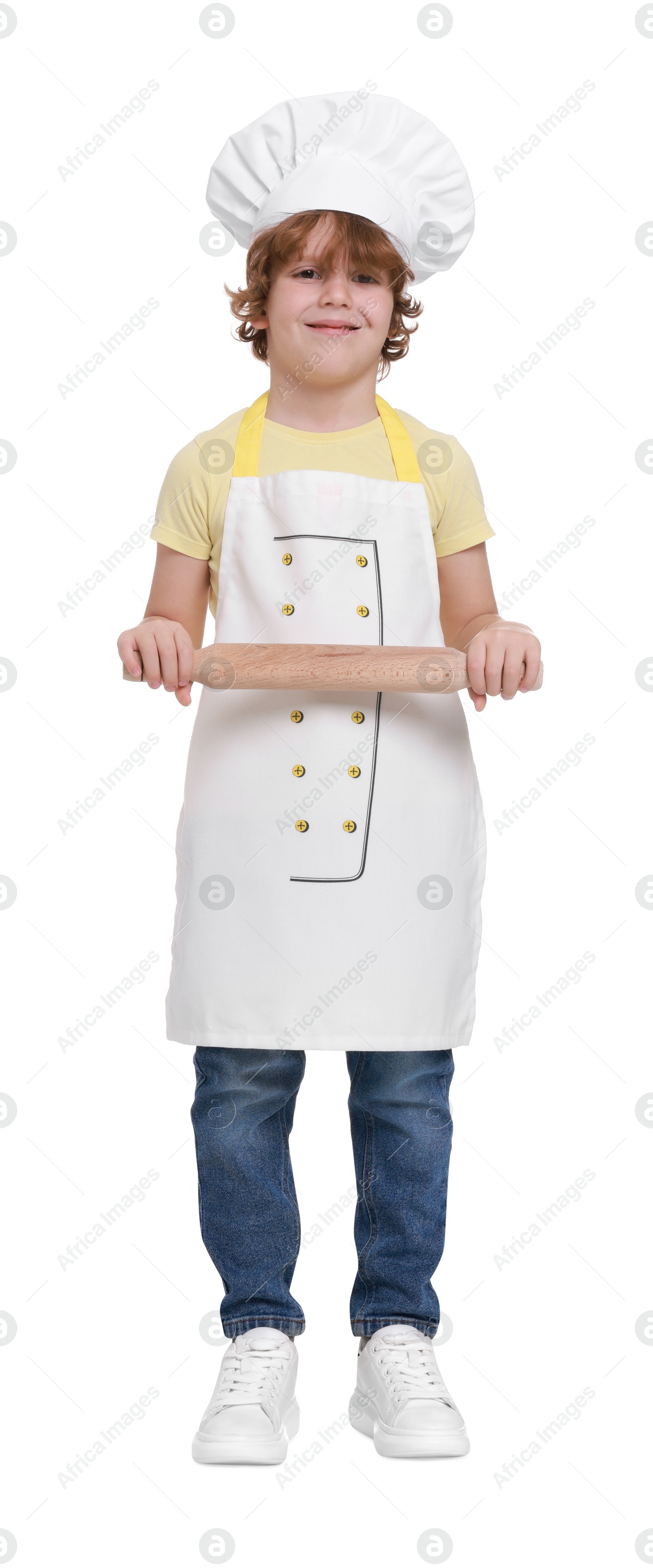 Photo of Little boy with rolling pin pretending to be chef on white background. Dreaming about future profession