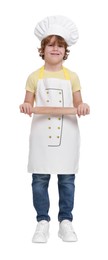 Photo of Little boy with rolling pin pretending to be chef on white background. Dreaming about future profession