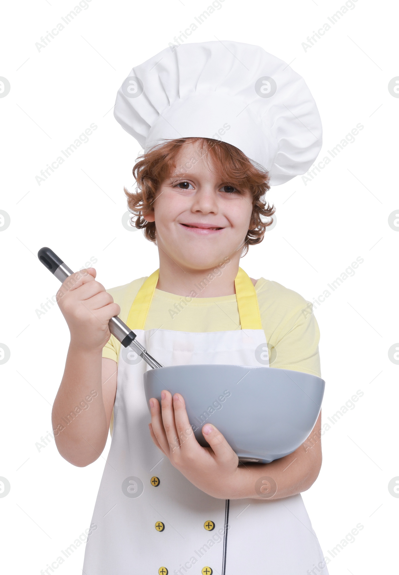 Photo of Little boy with bowl and whisk pretending to be chef on white background. Dreaming about future profession