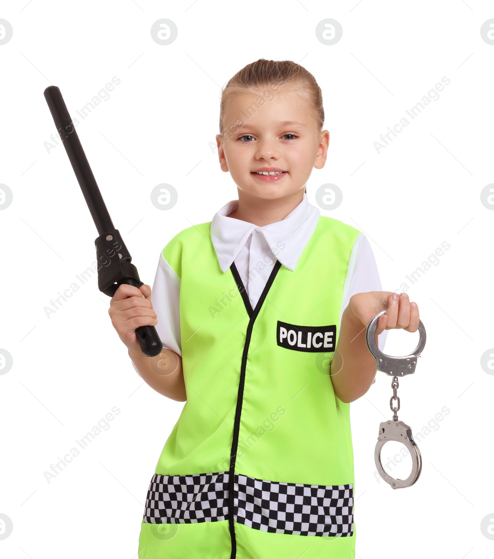 Photo of Little girl with baton and handcuffs pretending to be policewoman on white background. Dreaming of future profession