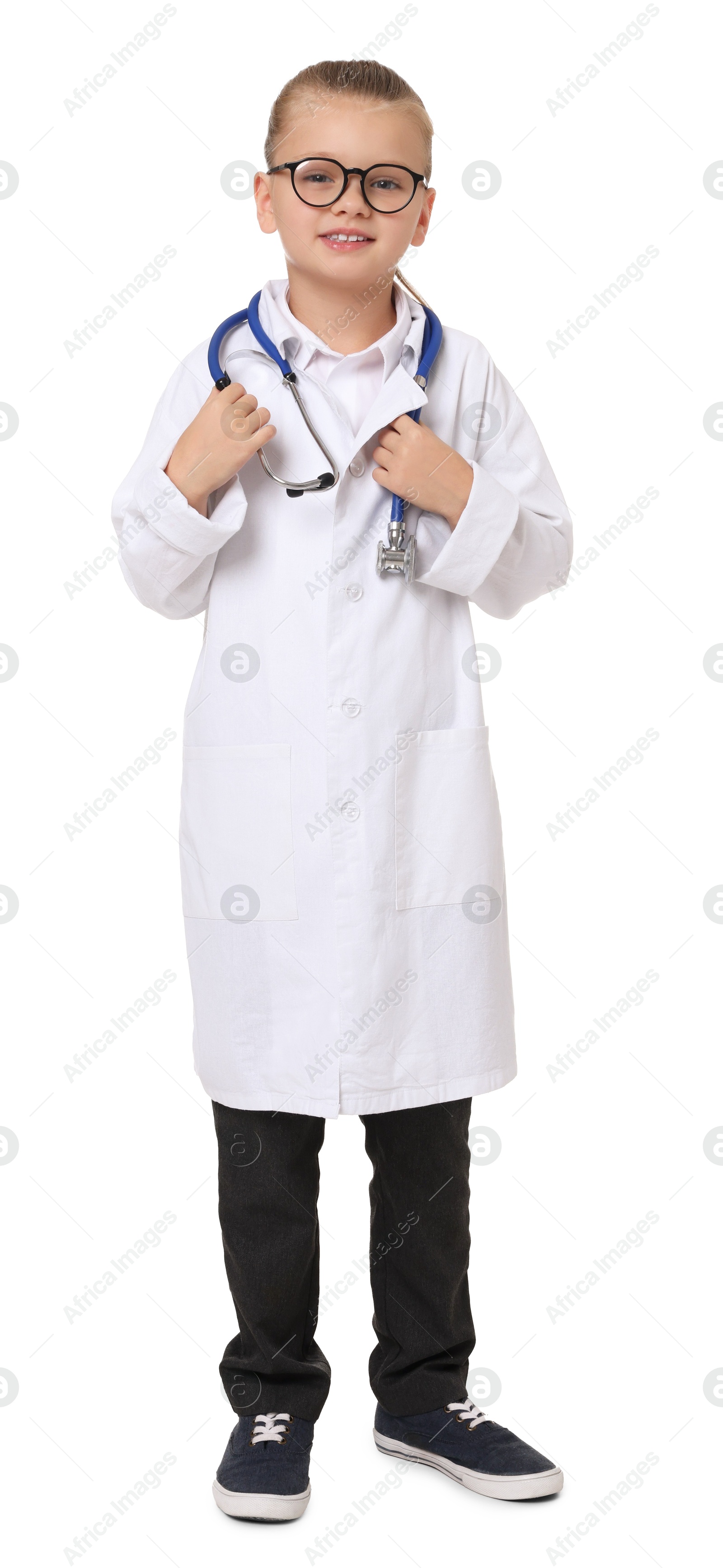 Photo of Little girl with stethoscope pretending to be doctor on white background. Dreaming of future profession