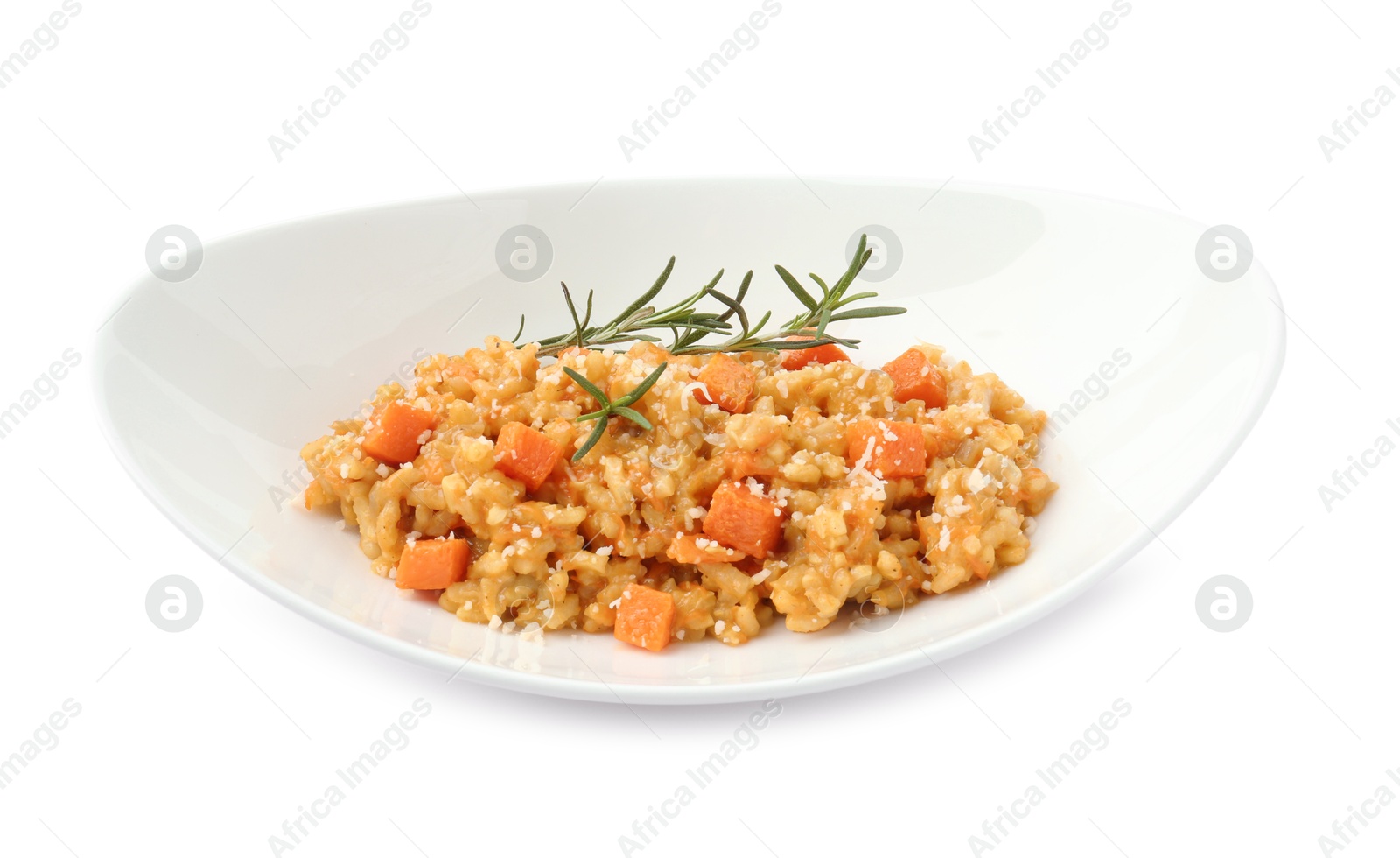 Photo of Delicious pumpkin risotto in bowl isolated on white