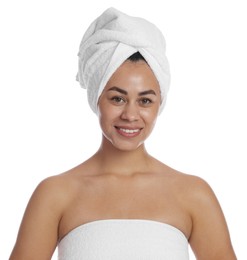 Photo of Beautiful young woman with towels on white background