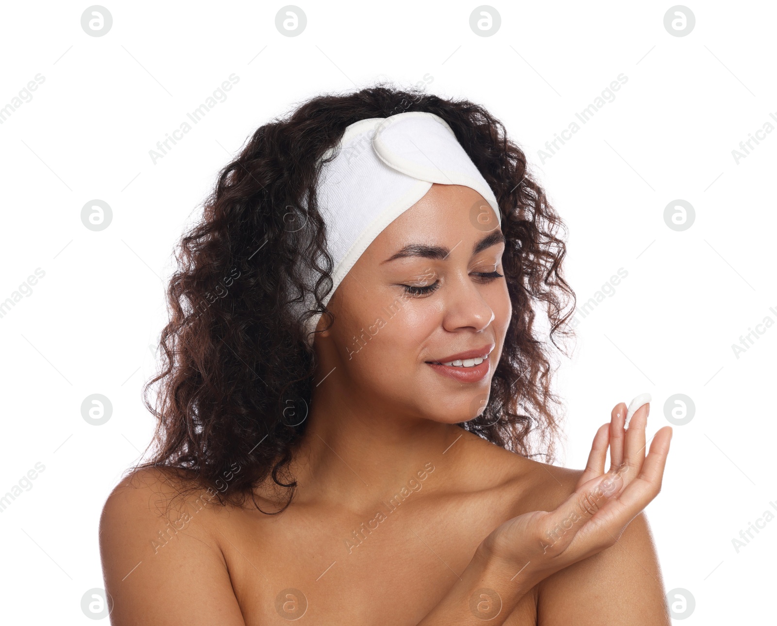 Photo of Beautiful woman with cream against white background