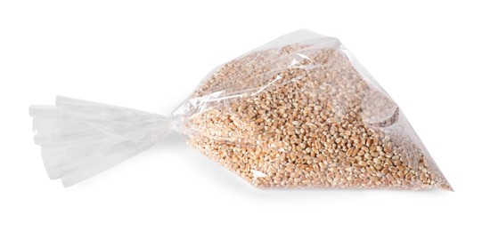 Photo of Plastic bag with wheat grains isolated on white