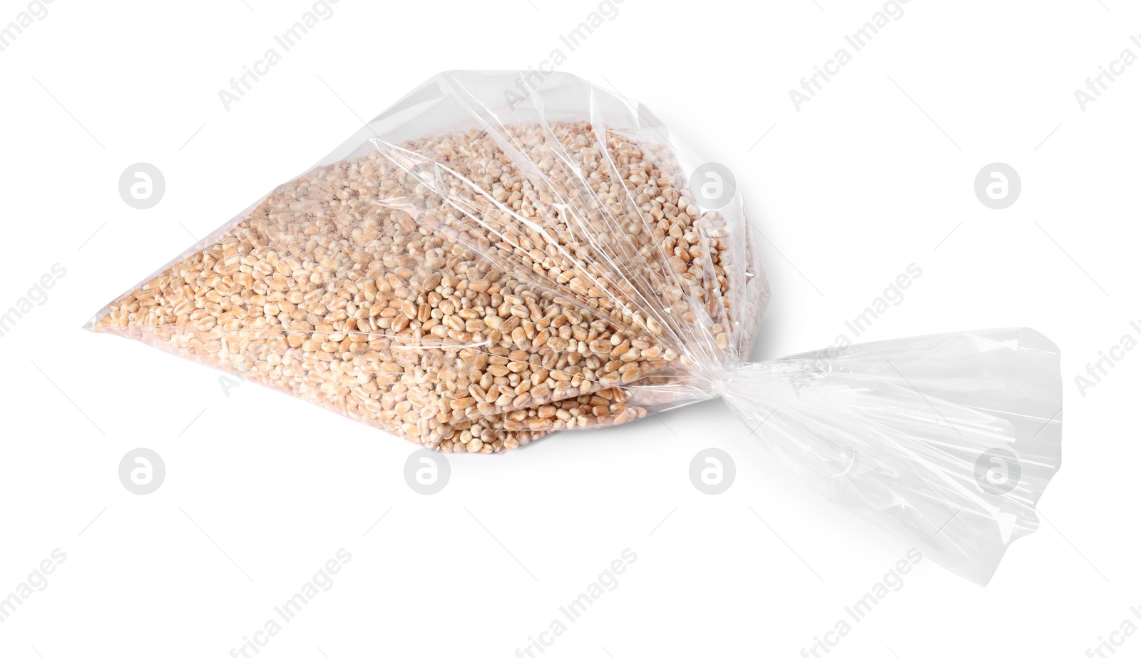 Photo of Plastic bag with wheat grains isolated on white