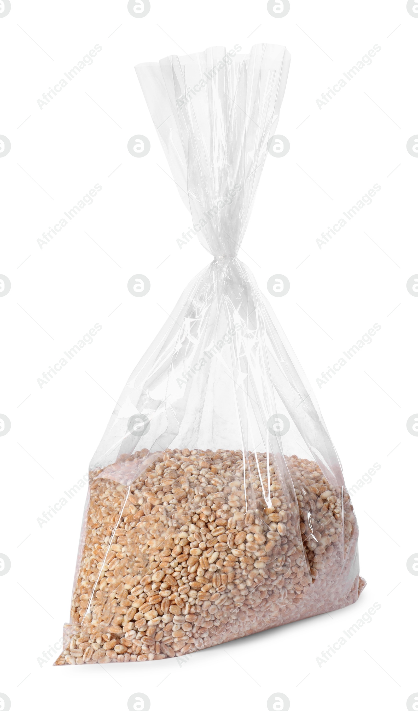 Photo of Plastic bag with wheat grains isolated on white