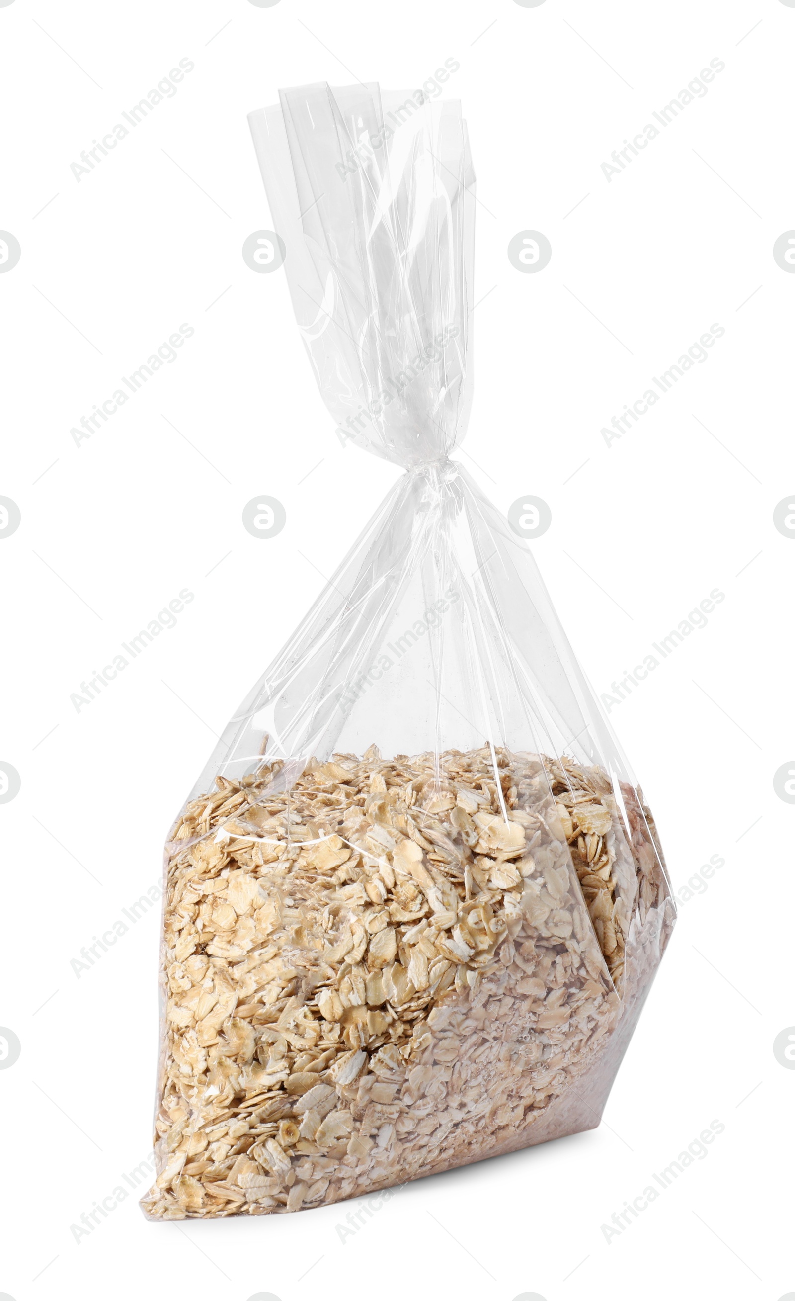 Photo of Plastic bag with oat flakes isolated on white