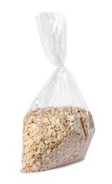 Photo of Plastic bag with oat flakes isolated on white