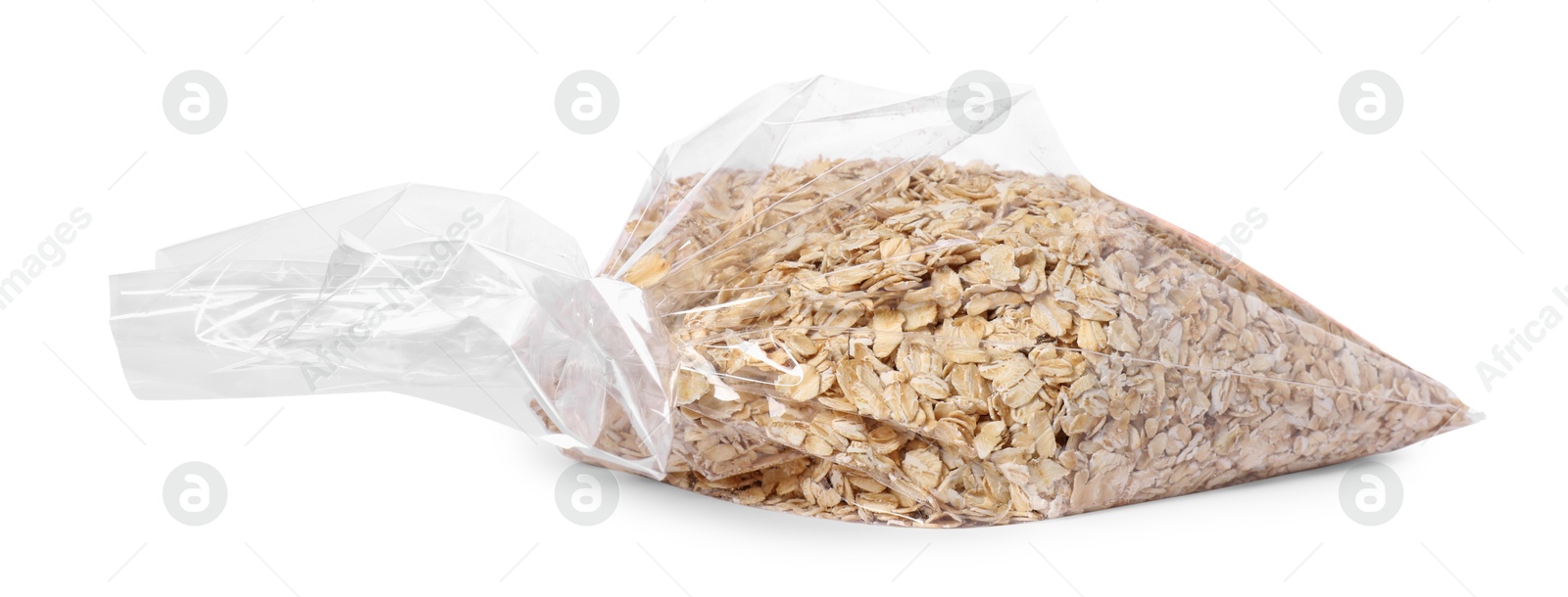 Photo of Plastic bag with oat flakes isolated on white