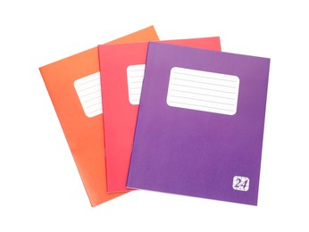 Photo of Colorful copybooks isolated on white, top view. School stationery