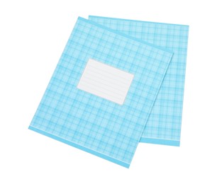 Photo of Blue copybooks isolated on white, top view. School stationery