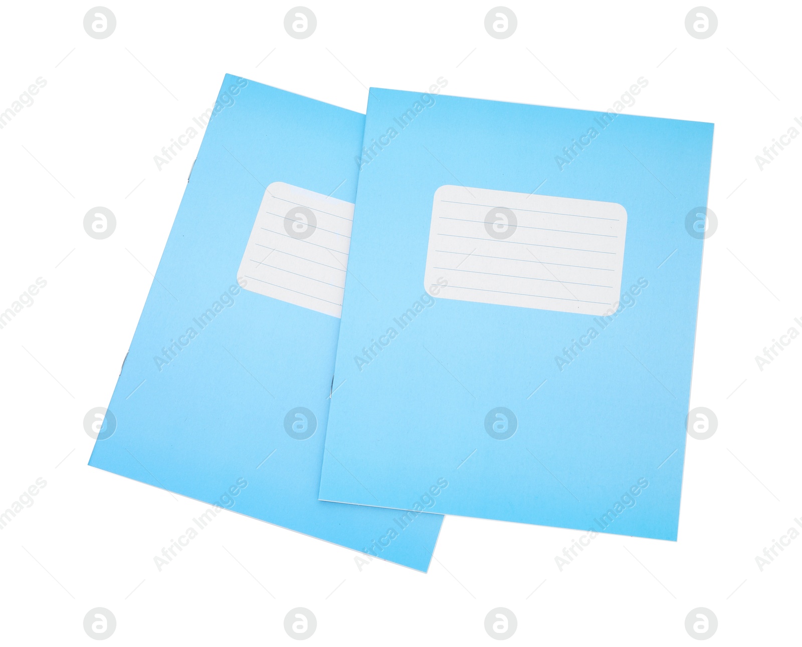 Photo of Blue copybooks isolated on white, top view. School stationery