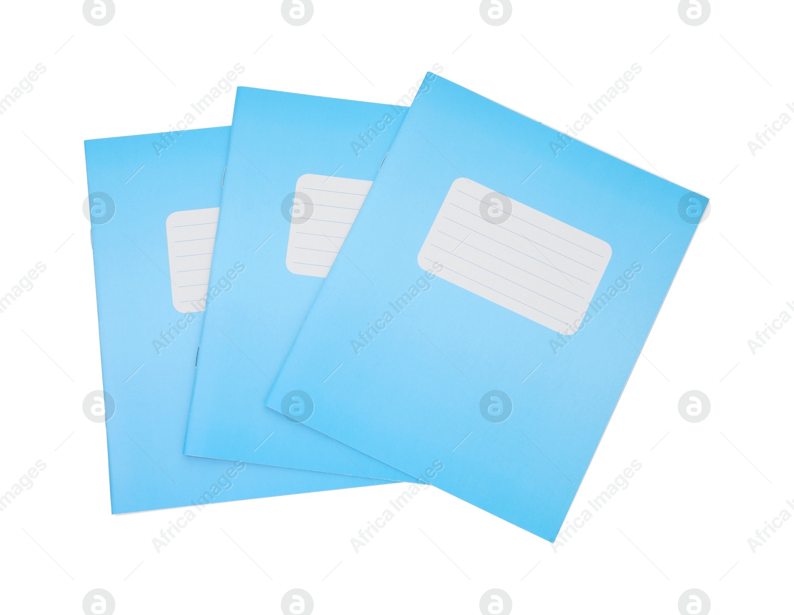 Photo of Blue copybooks isolated on white, top view. School stationery