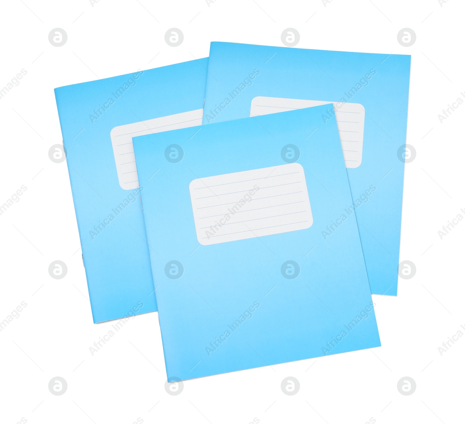 Photo of Blue copybooks isolated on white, top view. School stationery