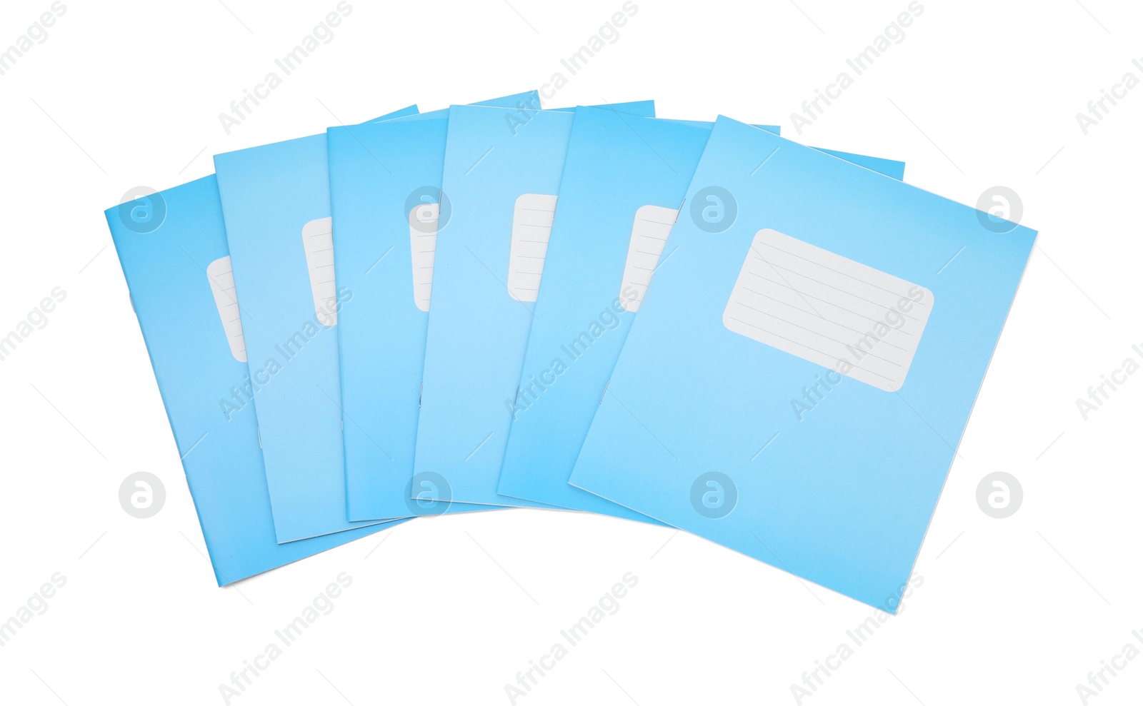 Photo of Blue copybooks isolated on white, top view. School stationery