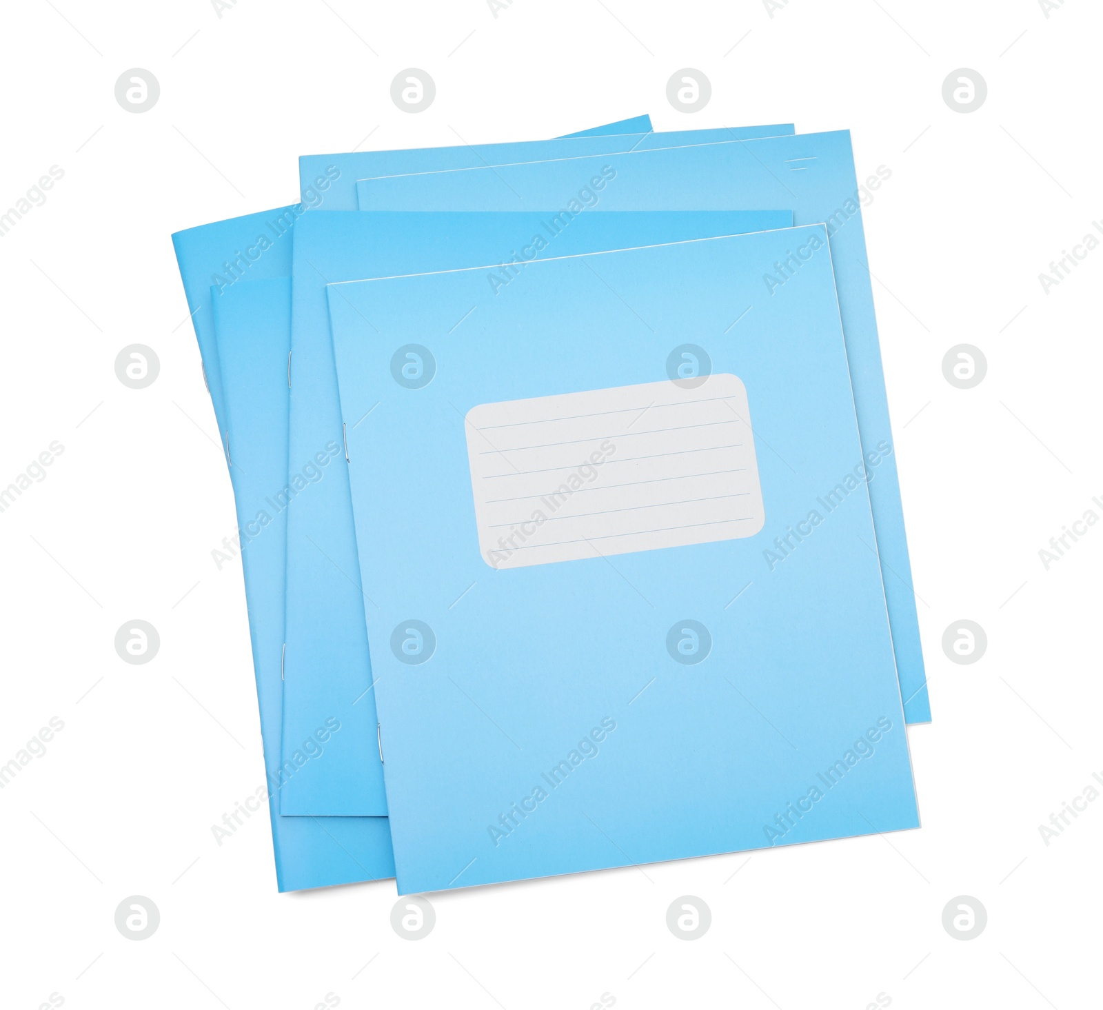 Photo of Stack of copybooks isolated on white, top view. School stationery