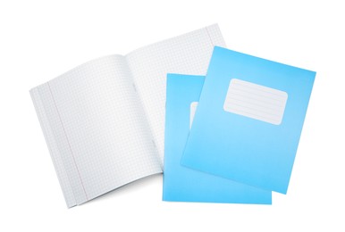 Photo of Copybooks isolated on white, top view. School stationery