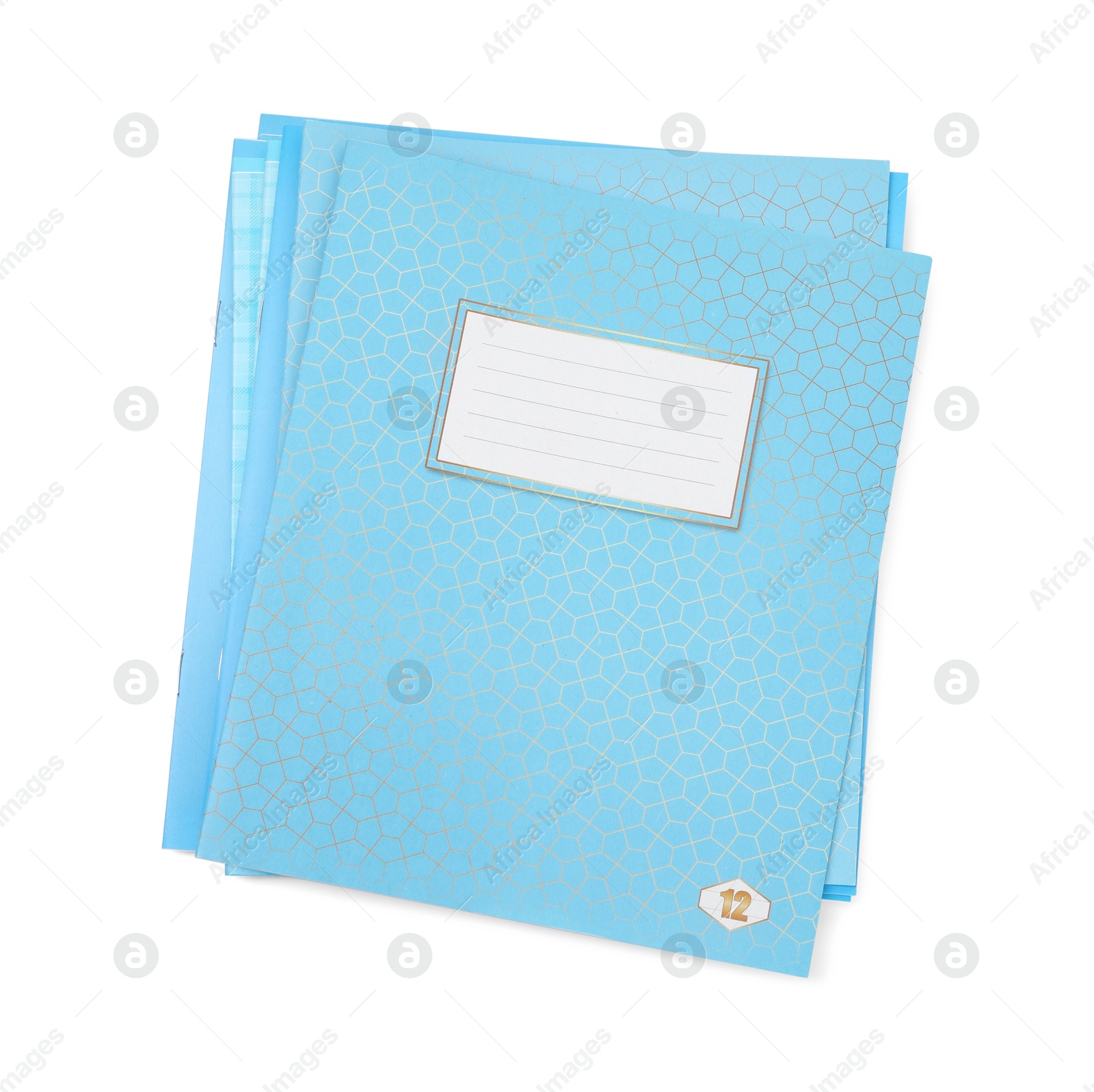 Photo of Stack of copybooks isolated on white, top view. School stationery