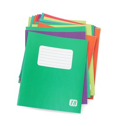 Photo of Stack of colorful copybooks isolated on white, top view. School stationery