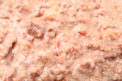 Wet pet food as background, closeup view