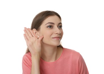 Photo of Woman showing hand to ear gesture on white background