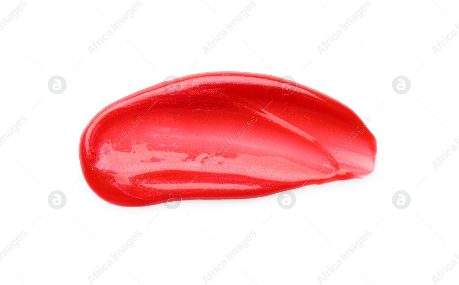 Photo of Red lip gloss isolated on white, top view. Sample of cosmetic product