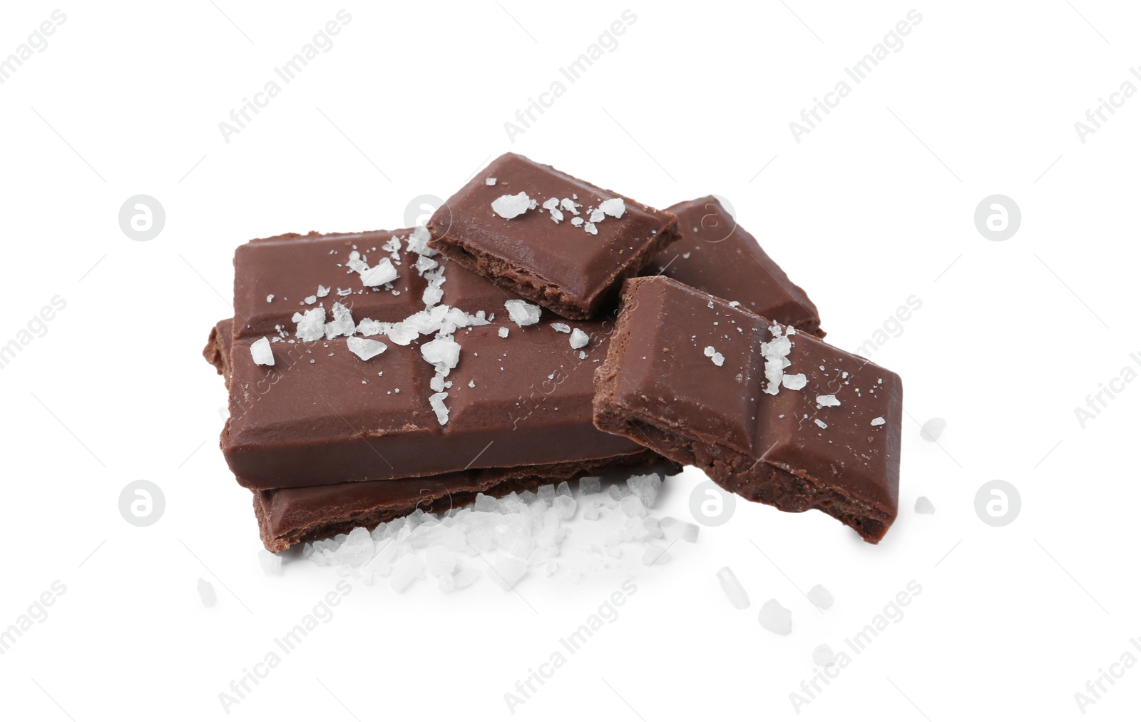 Photo of Pieces of chocolate with salt isolated on white