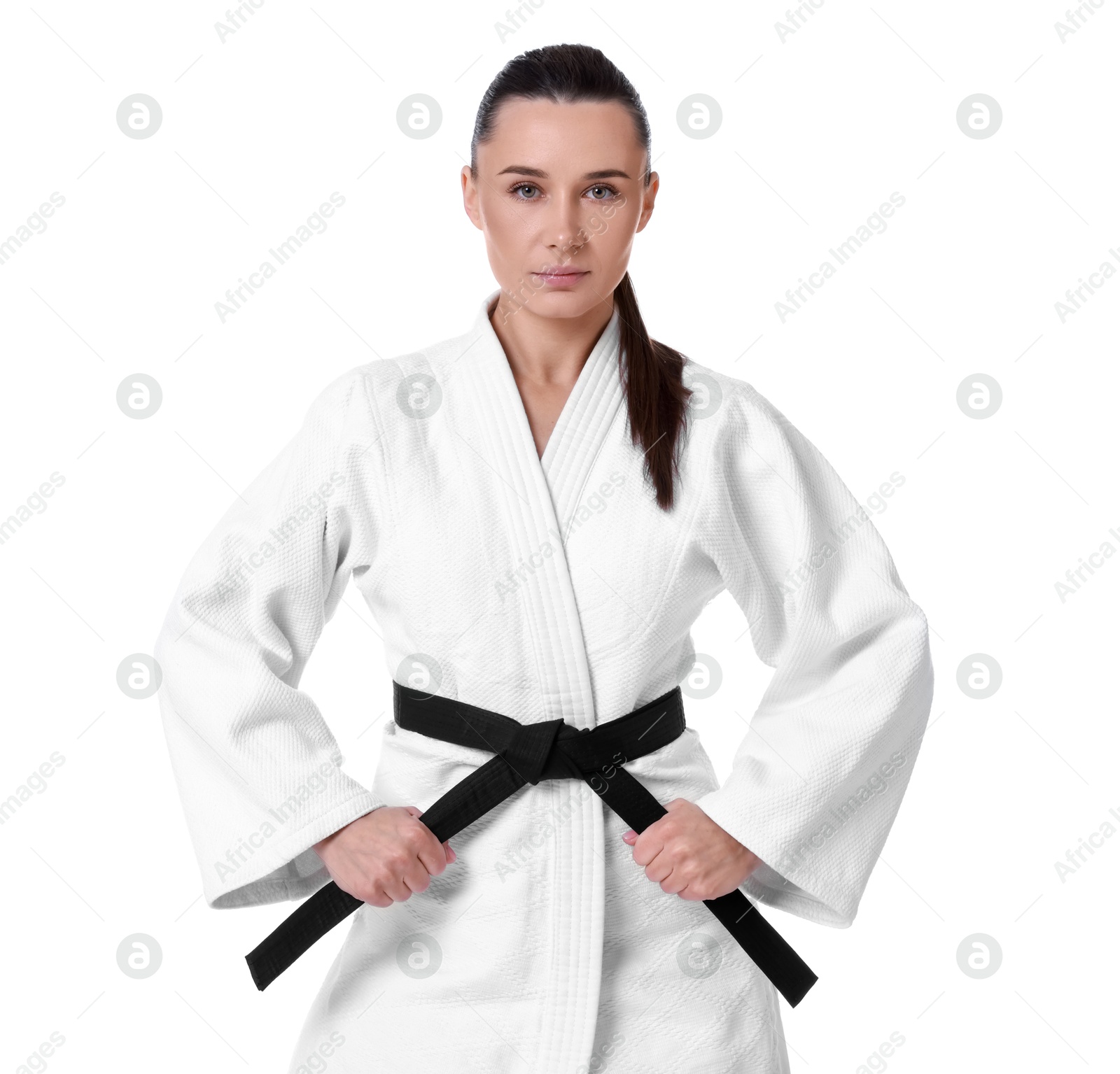 Photo of Karate fighter in kimono isolated on white