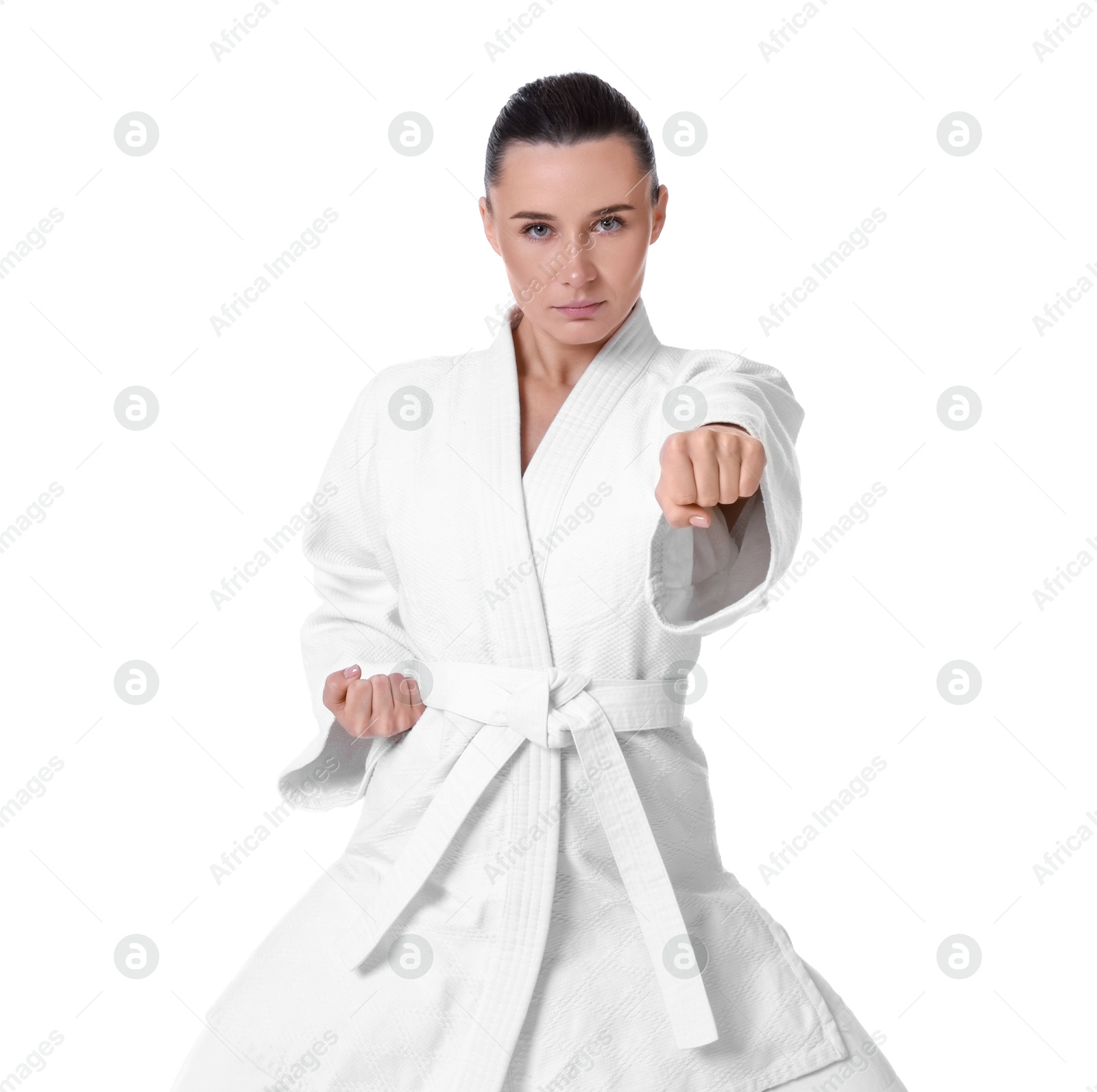 Photo of Karate fighter in kimono isolated on white