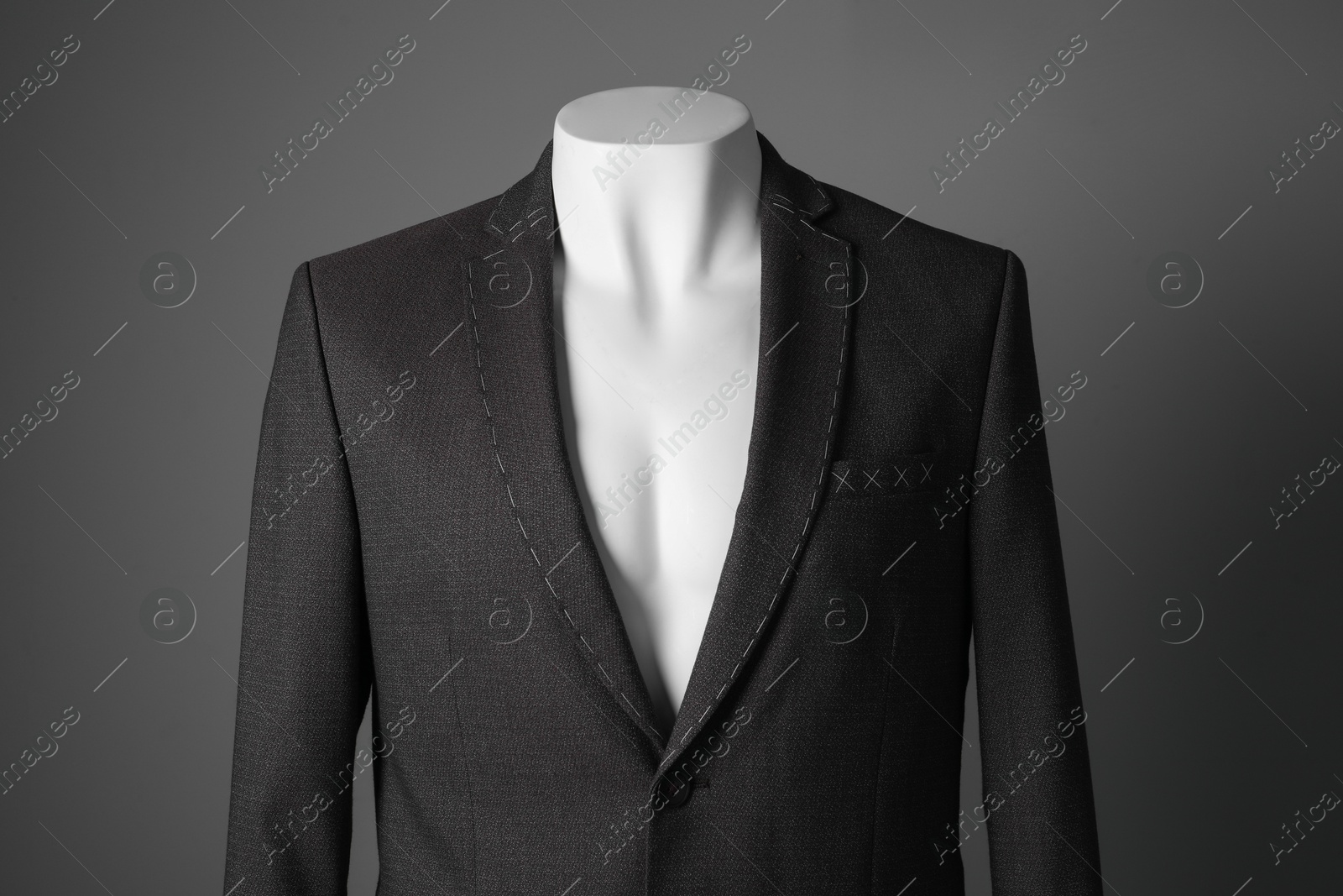 Photo of Semi-ready jacket on mannequin against grey background