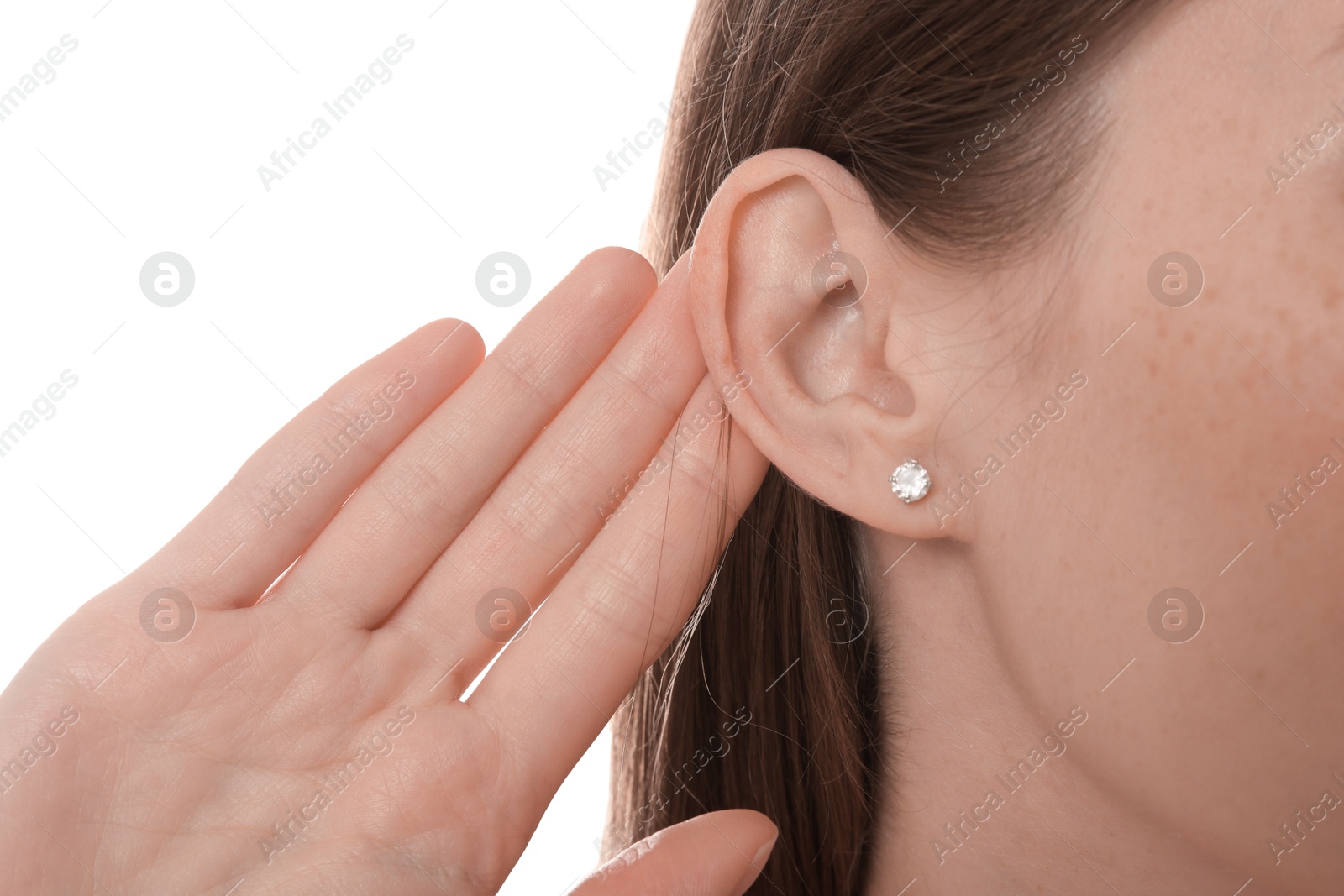 Photo of Woman showing hand to ear gesture on white background, closeup