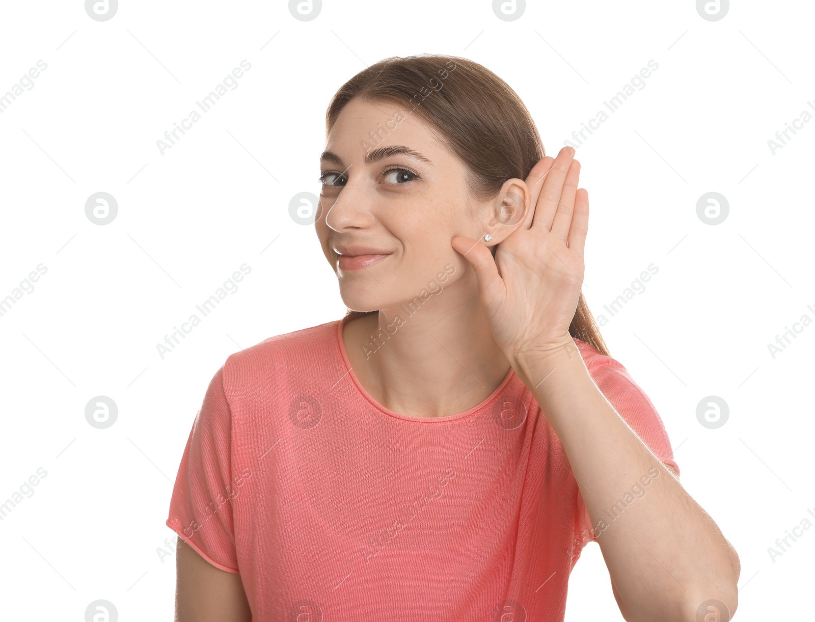 Photo of Woman showing hand to ear gesture on white background