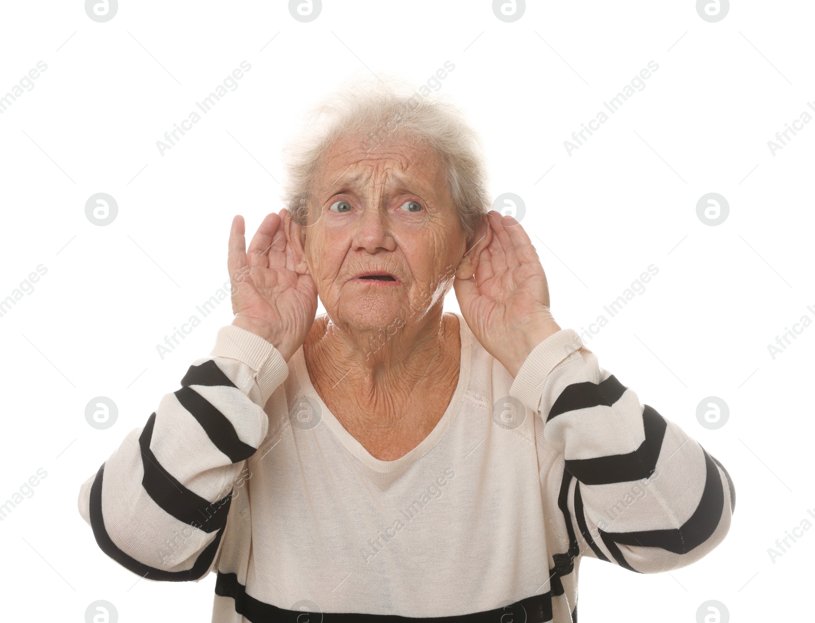 Photo of Senior woman showing hand to ear gesture on white background