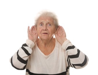 Photo of Senior woman showing hand to ear gesture on white background