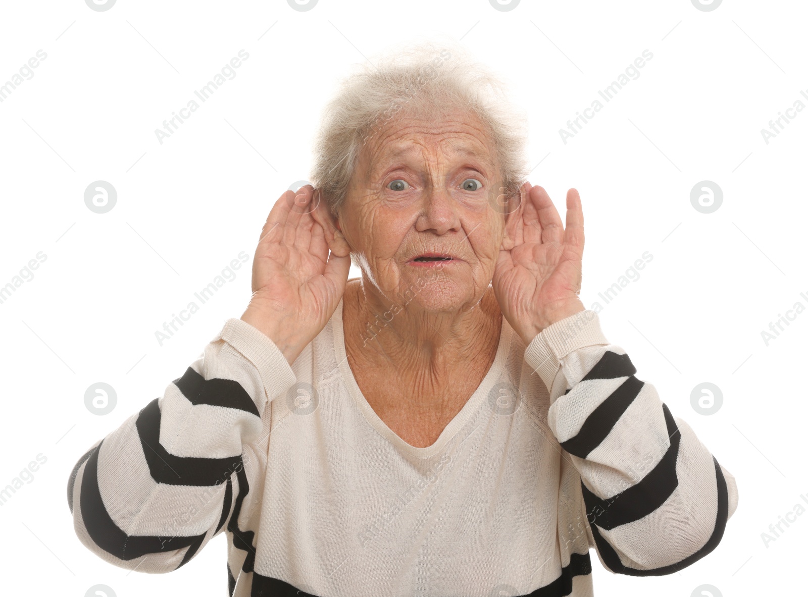 Photo of Senior woman showing hand to ear gesture on white background