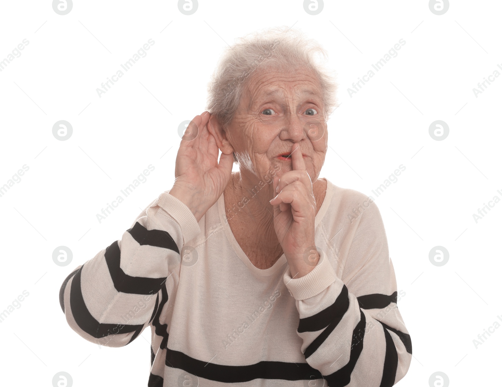 Photo of Senior woman showing hand to ear gesture on white background