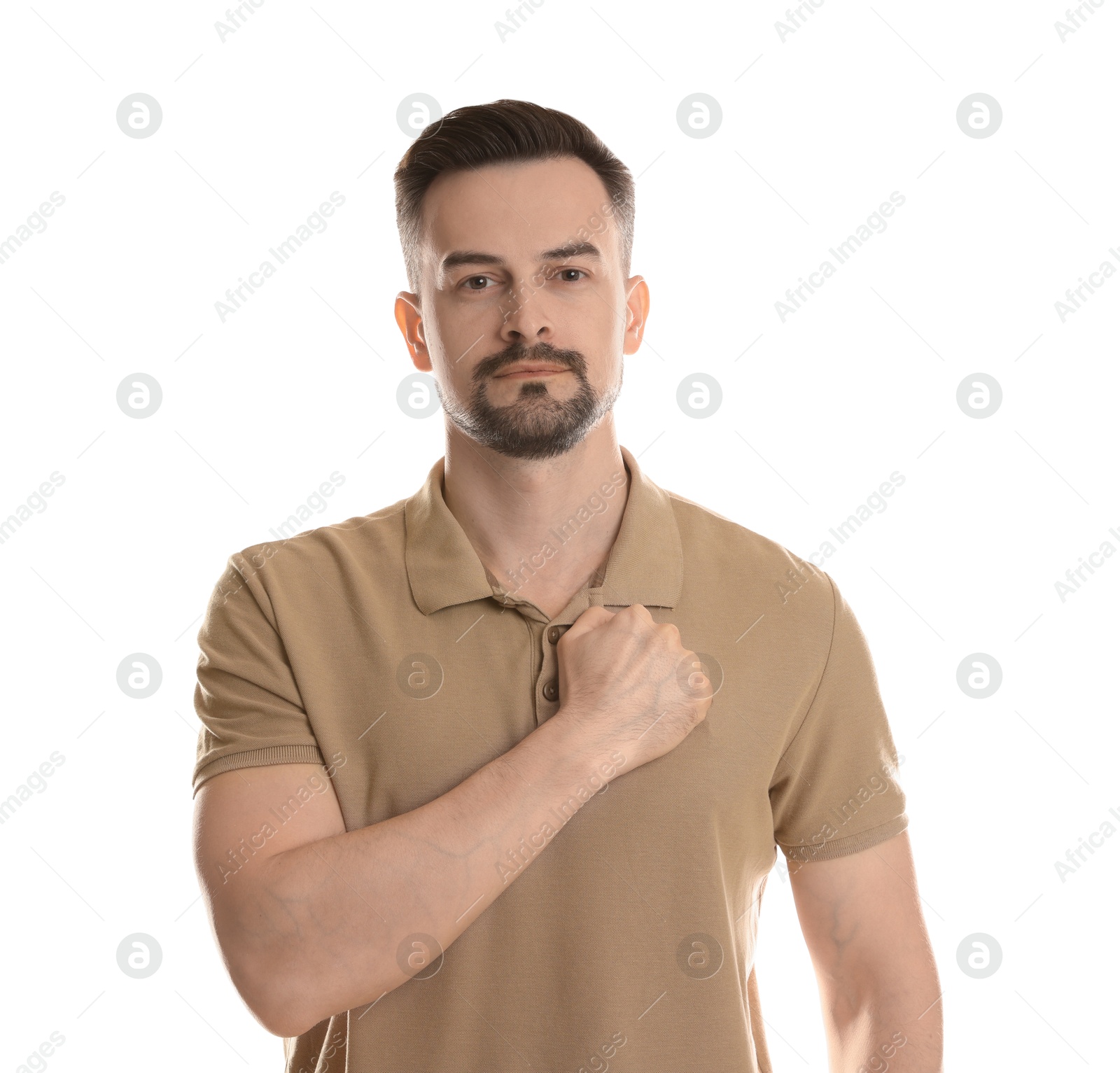 Photo of Man making promise on white background. Oath gesture