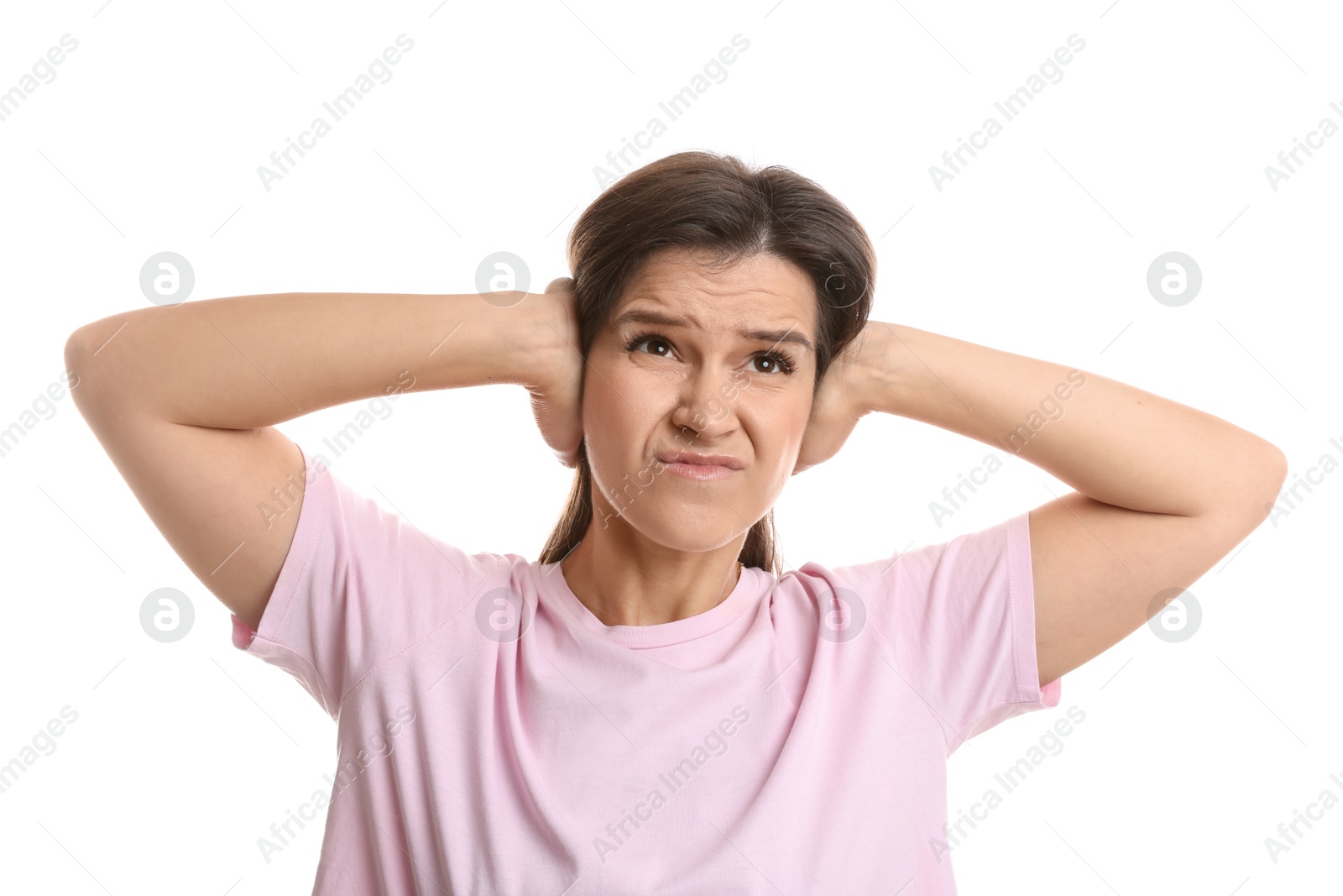 Photo of Woman covering her ears on white background