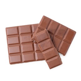 Photo of Pieces of delicious milk chocolate isolated on white, top view