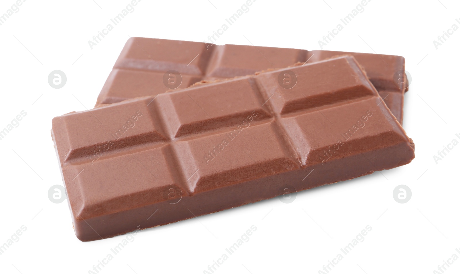 Photo of Pieces of delicious milk chocolate isolated on white