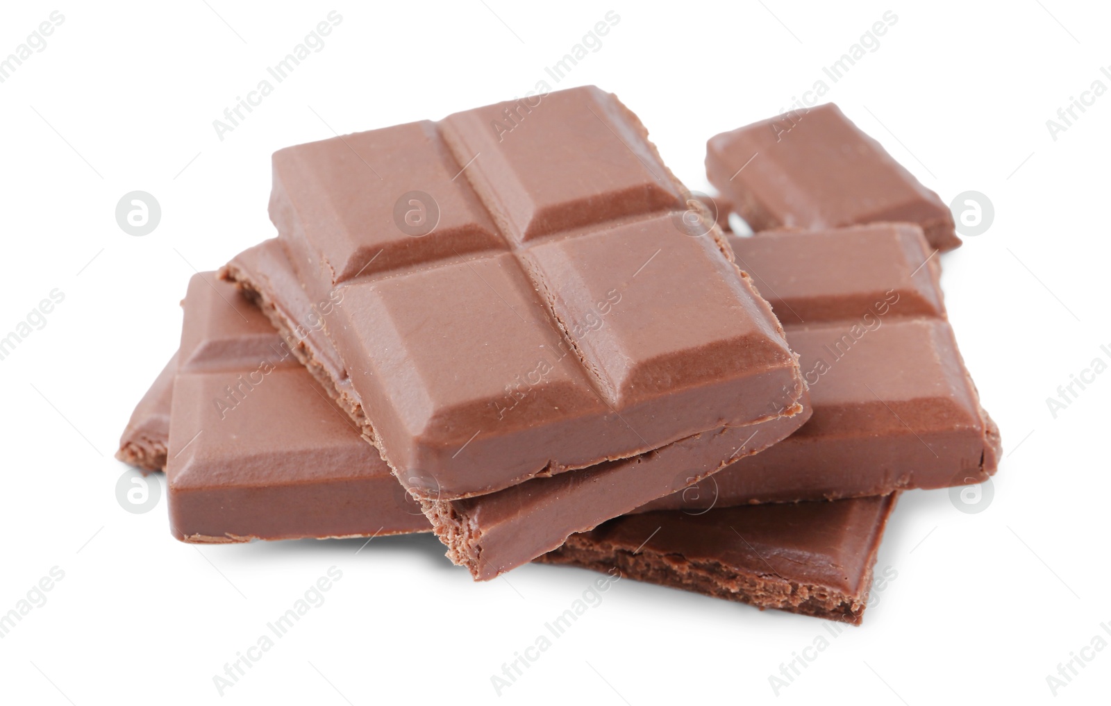 Photo of Pieces of delicious milk chocolate isolated on white