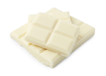 Photo of Pieces of delicious white chocolate isolated on white