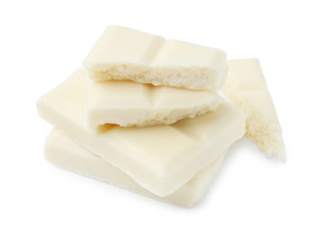 Photo of Pieces of delicious white chocolate isolated on white